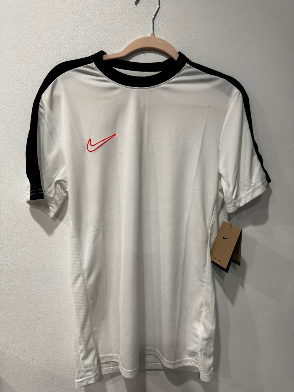 Nike Men’s White Short-Sleeve Training Shirt with Black Trim and Red Swoosh